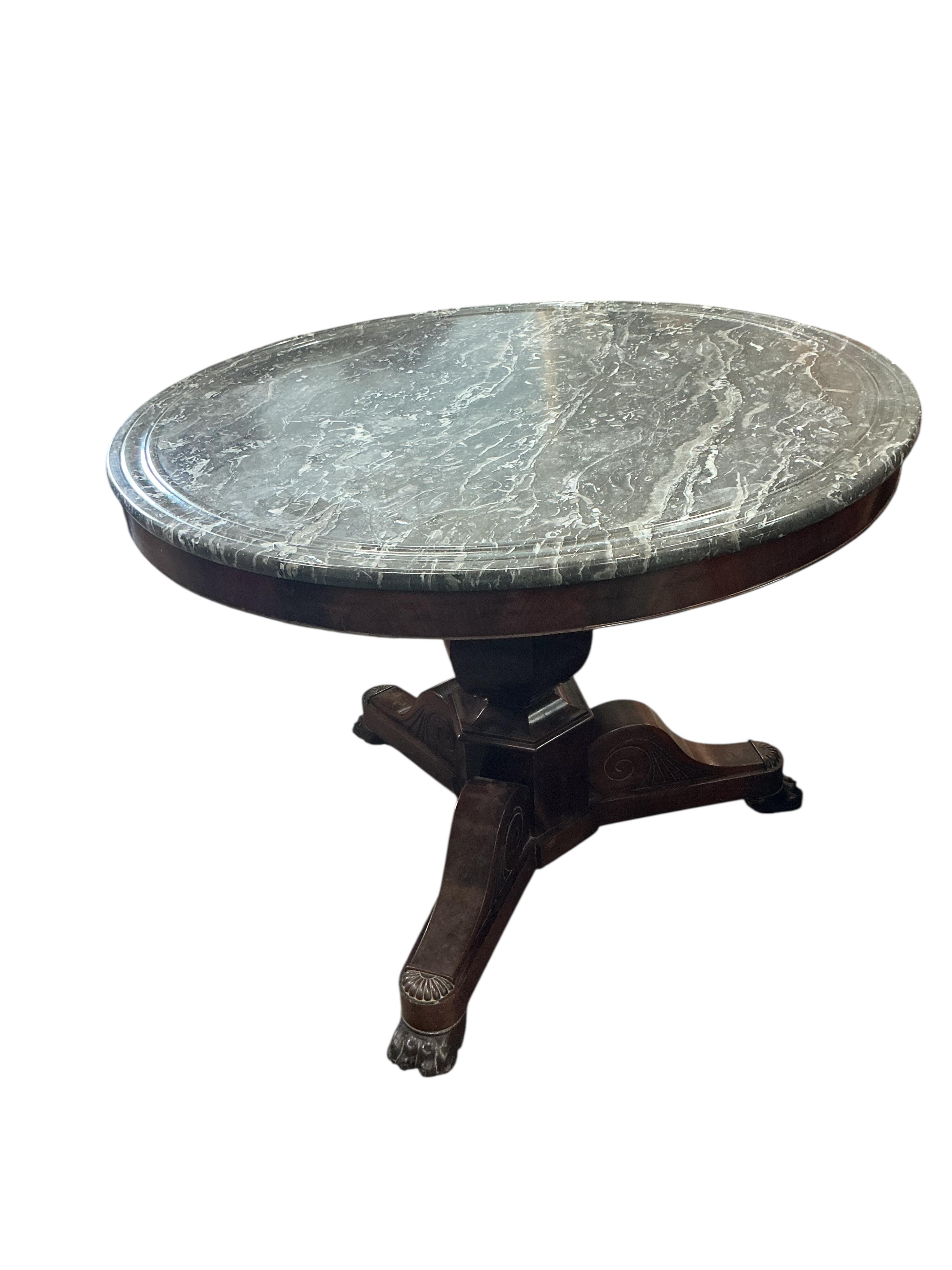 A French Empire circular marble top mahogany centre table, diameter 98cm, height 77cm